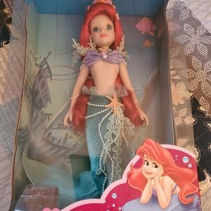 16 inch Disney Porcelain Ariel 2003 sealed in original packaging.